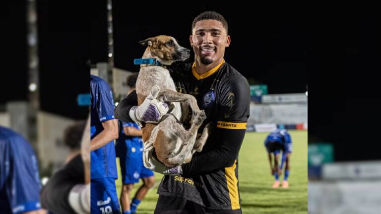 Cachorro adotado por clube levanta taça com jogadores do time do Iguatu, no Ceará